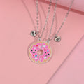 Two matching zinc alloy pendants in donut and watermelon shapes with glossy oil drip finish on cross chains