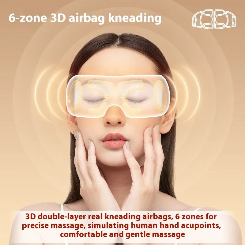 White rechargeable eye massager with airbag massage and hot compress functions on a plain background.
