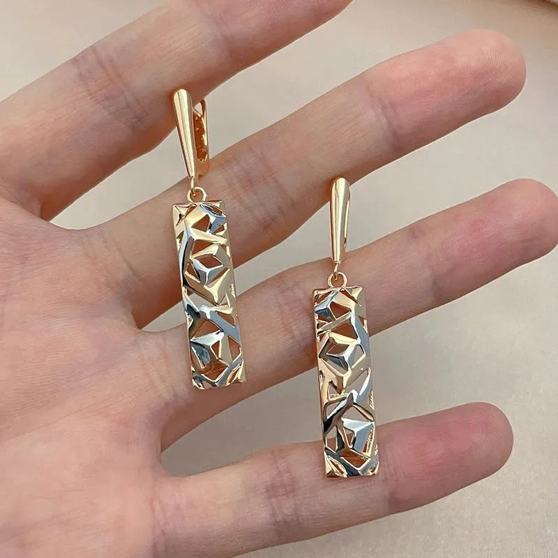 Rectangular hollow stud earrings with a two-tone colour geometric design