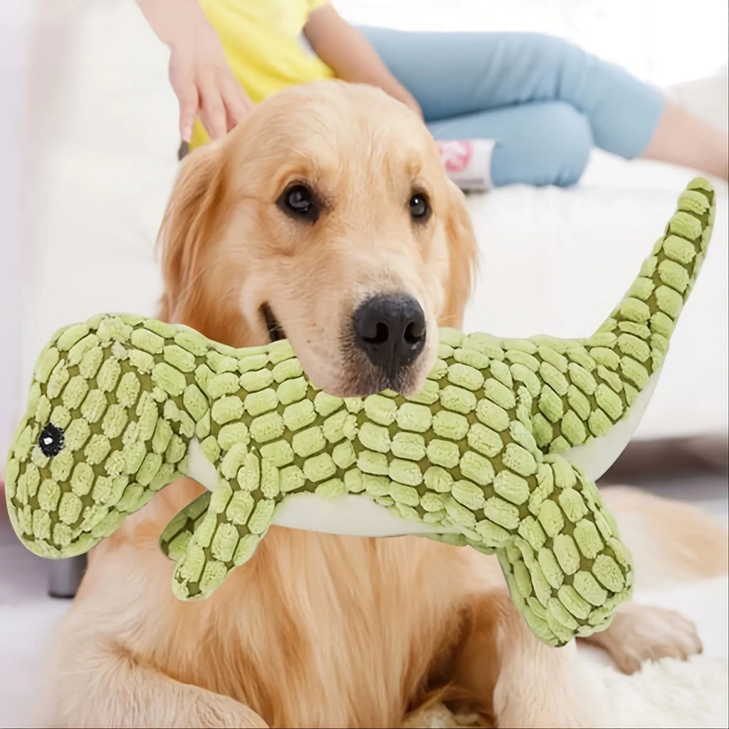 Grey, green, and orange durable dog toys with sound for chewing and boredom relief.