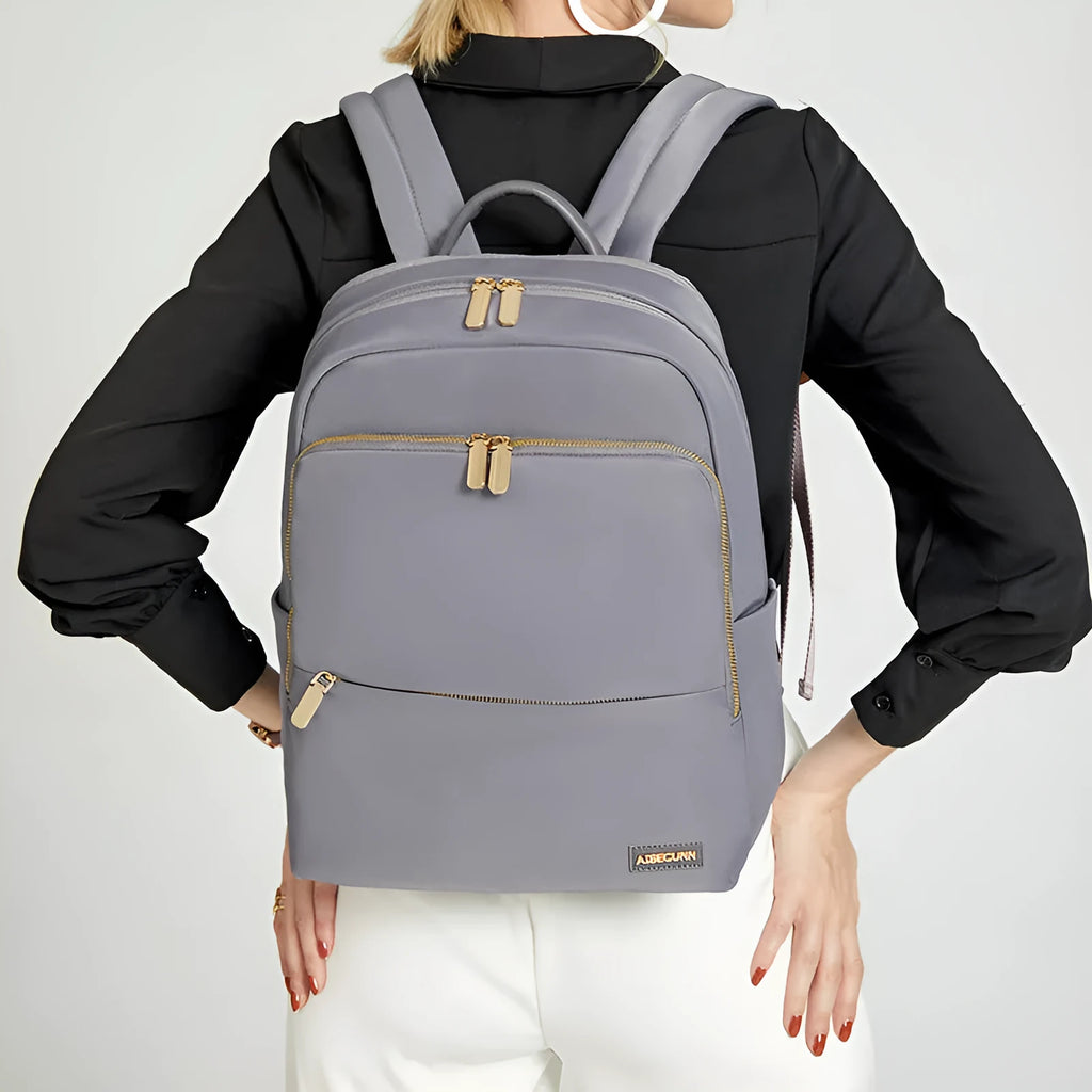 Oxford cloth women's backpack in black or purplish grey with large capacity and anti-theft design