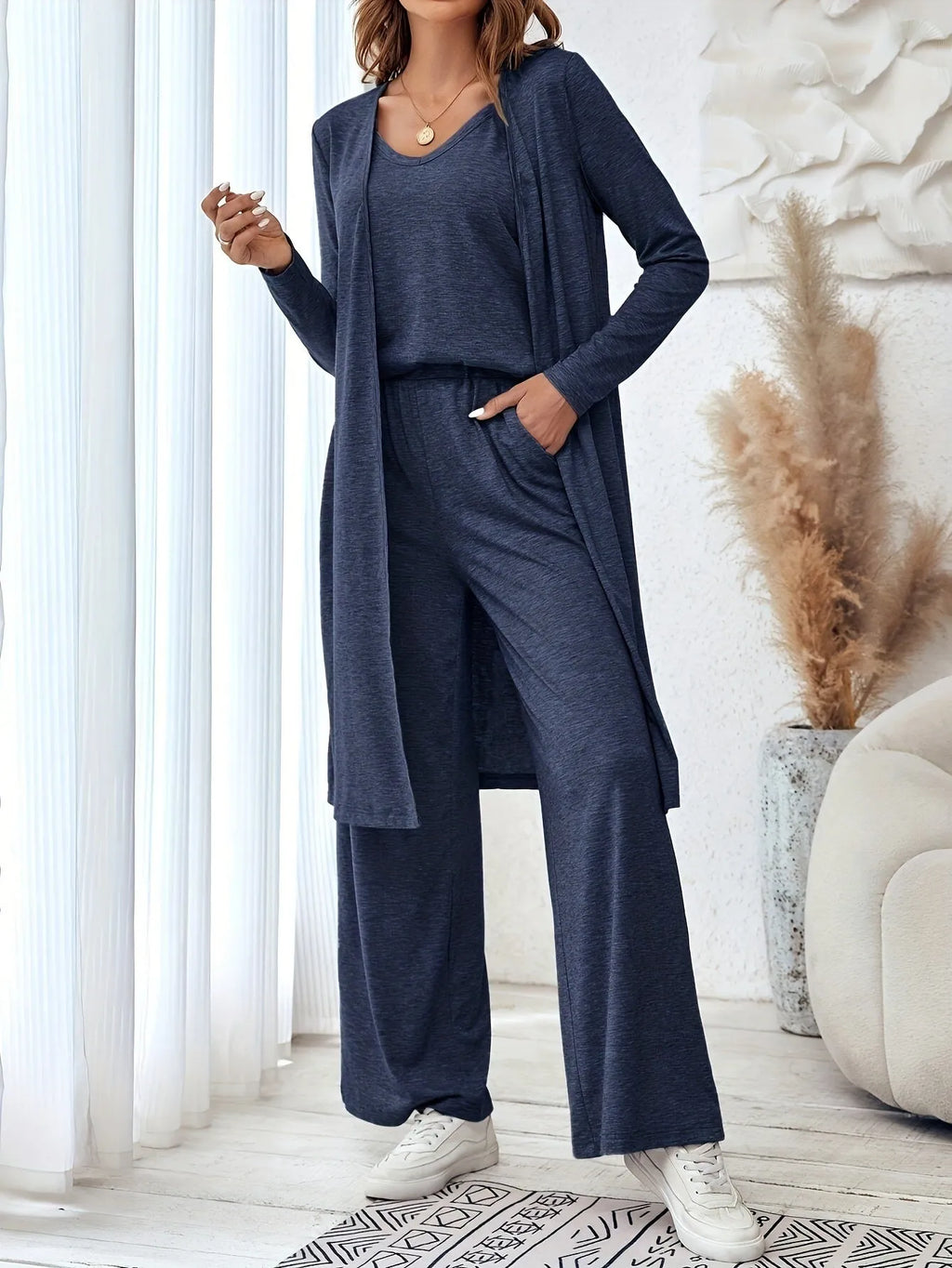 Women's blue polyester three-piece casual suit with sling top, long cardigan, and trousers