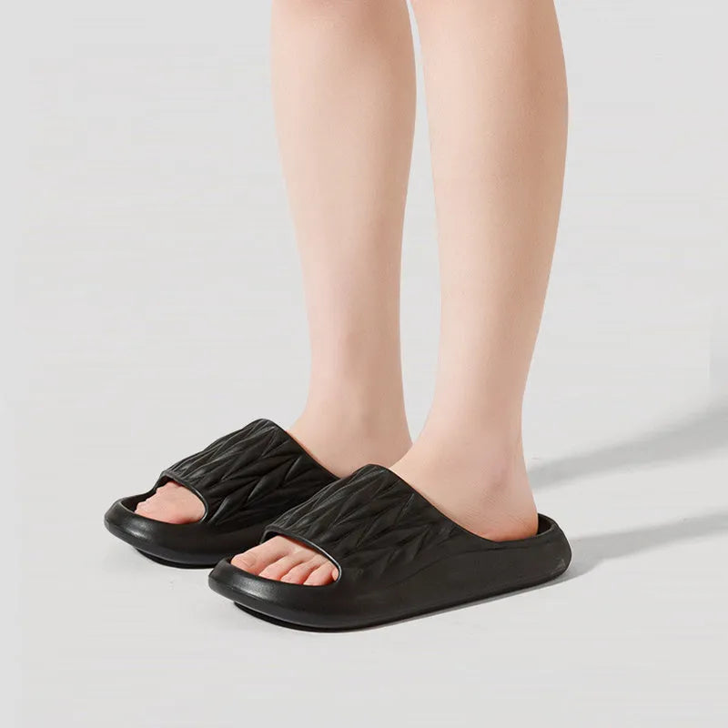 Leaf texture design EVA slippers in various colours showing non-slip sole detail