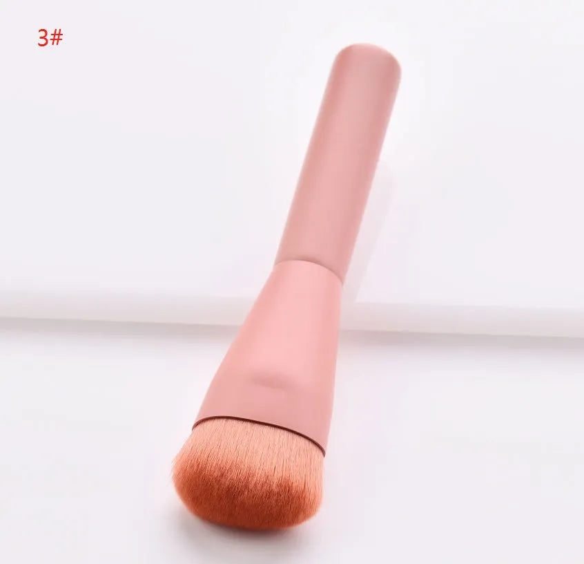 Open case showing 10 pink-handled makeup brushes including loose powder, foundation, flat head, and double-ended brushes.