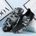 Men's and women's quick-drying mesh beach shoes with lace-up front and non-slip rubber sole.