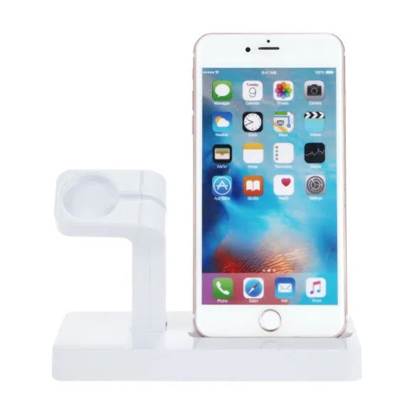 White 2-in-1 charging dock station holding an iPhone and an Apple Watch upright on a desk.