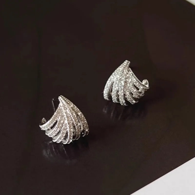 Geometric zircon earrings with platinum electroplated finish and clean line design