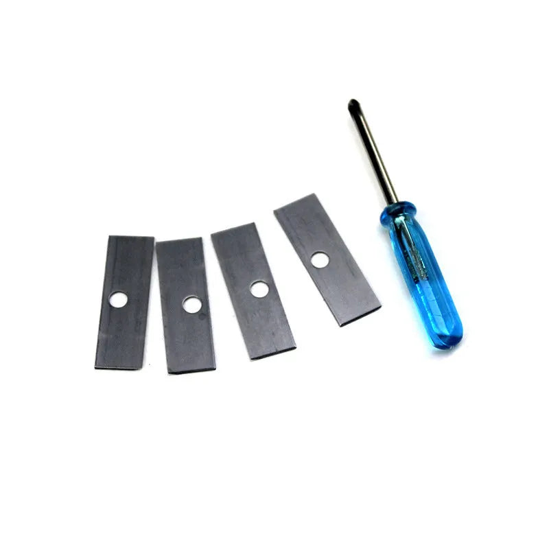 Geometric-shaped plastic pencil sharpener with four holes and a small screwdriver.