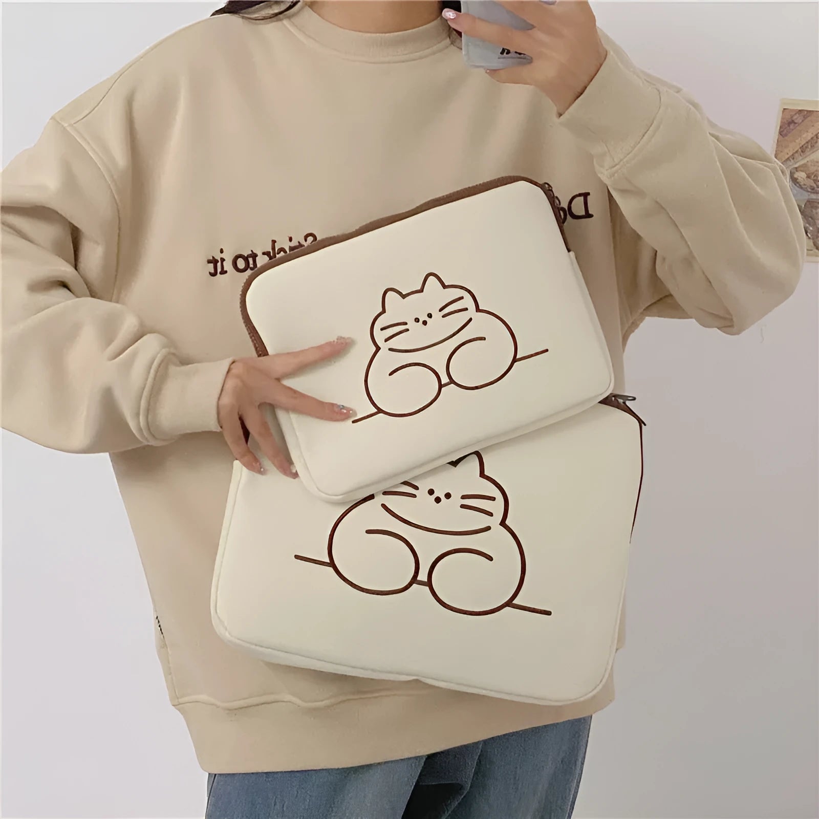 Embroidered cat design tablet protective sleeve in nylon with zipper closure