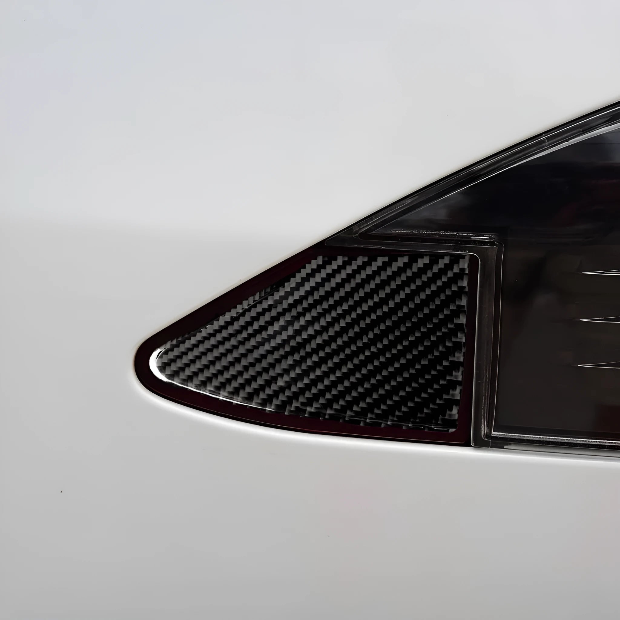 Carbon fibre texture sticker for covering a laptop charging port panel
