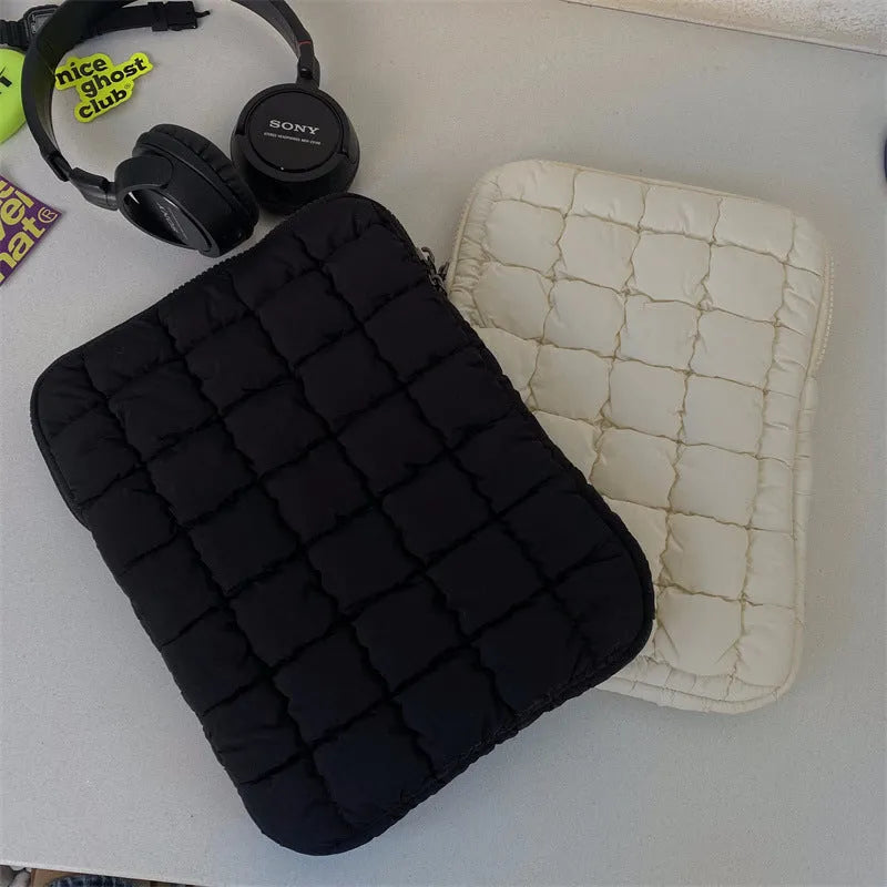 Black nylon laptop shoulder bag showing large capacity and shoulder strap