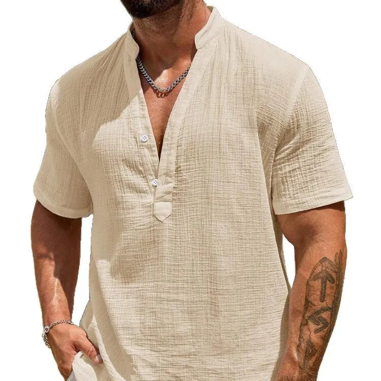 Men's solid colour stand collar short-sleeved shirt laid flat.