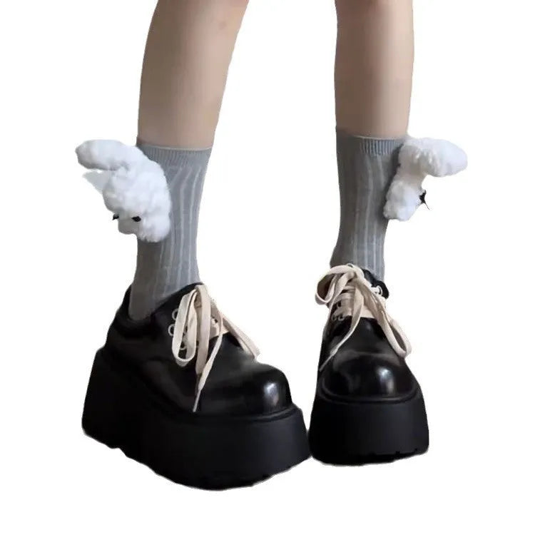Women's matte black retro chunky sole lace-up ankle boots with a round toe on a white background.