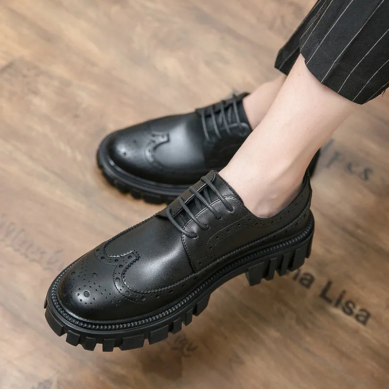 Men's black brogue leather shoes with round toe and traditional brogue detailing