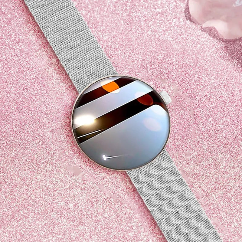 Women's circular smart watch with colour screen and metal strap on wrist