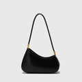 Retro oval women's underarm bag in PU leather with a single shoulder strap and zip pocket.