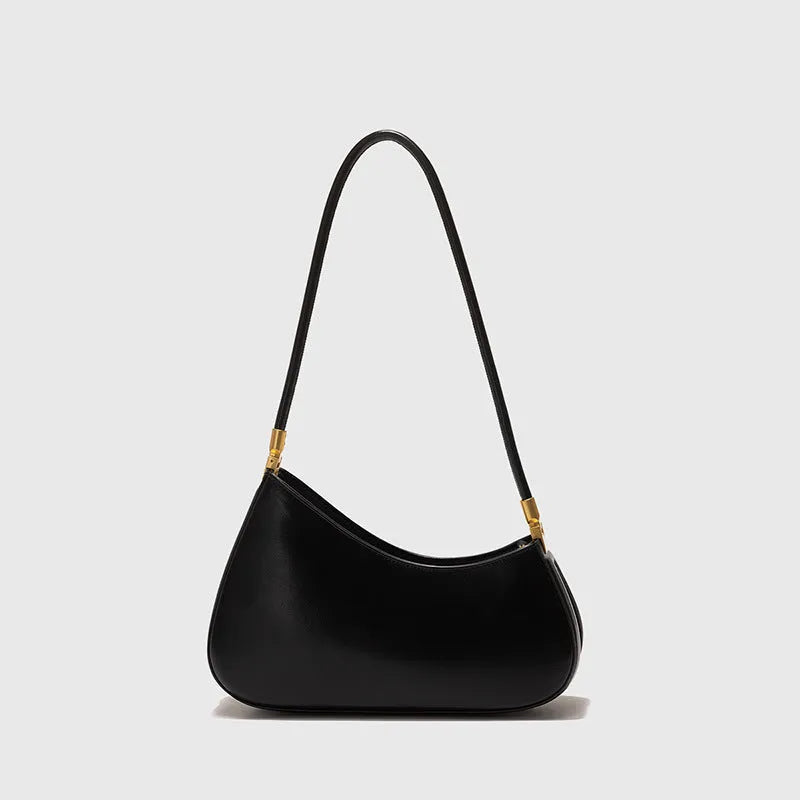 Retro oval women's underarm bag in PU leather with a single shoulder strap and zip pocket.