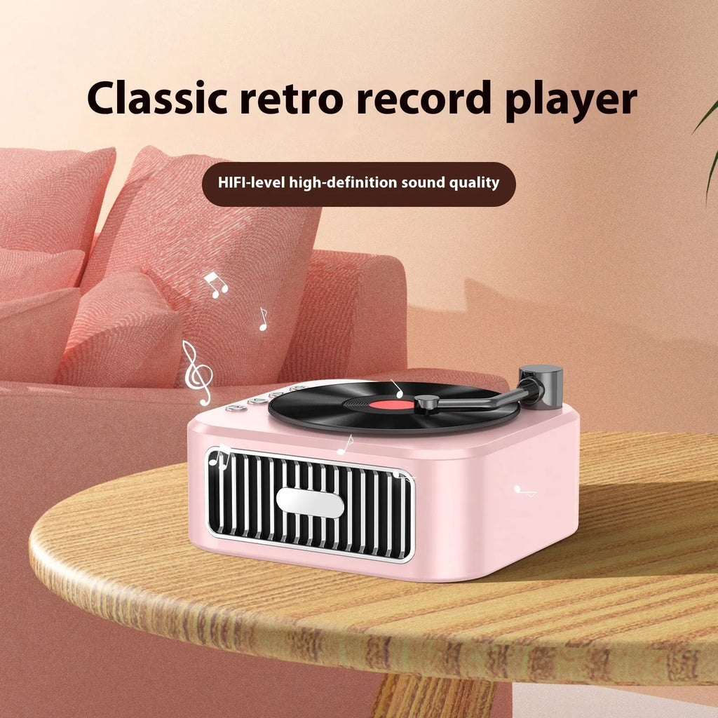Retro jukebox-style Bluetooth speaker in sunset pink with vinyl record design and karaoke microphone.