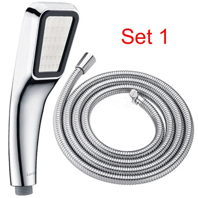 Orange hand-held pressurised shower head with rain function, part of a complete shower set