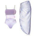 Purple one-piece swimsuit with matching wrap skirt in polyester fabric