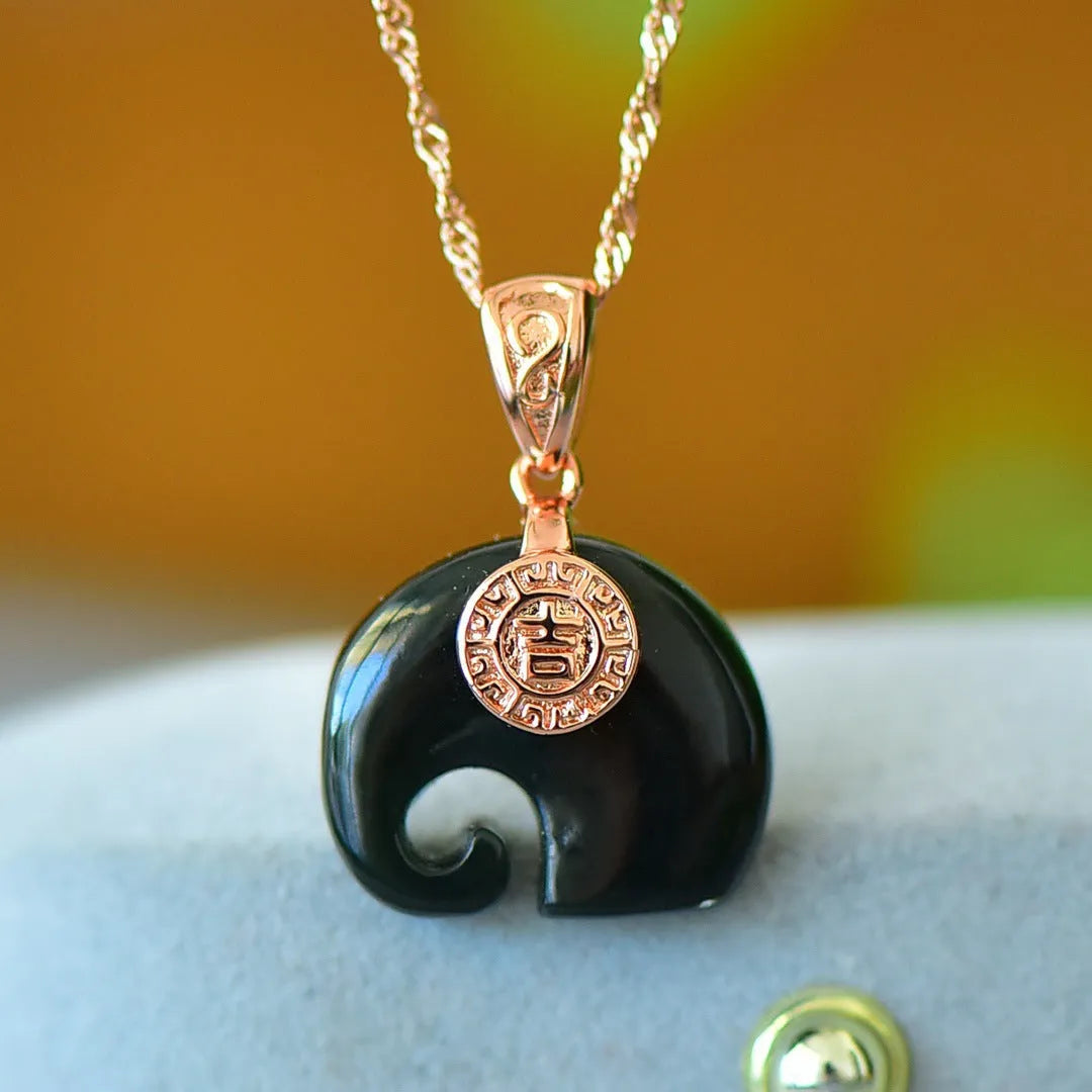 Natural Hetian gray jade pendant with copper inlay detailing showing ink blue jadeware patterning