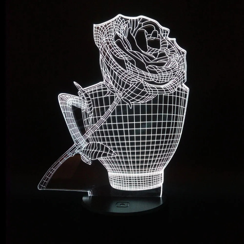 3D rose flower shaped night light with remote control on a table.