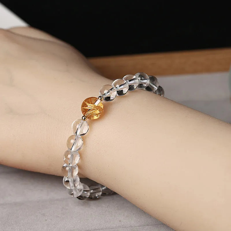 Geometric obsidian and white crystal bracelet with black agate beads and golden dragon centrepiece for 14-16cm wrists