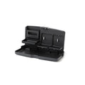 Foldable black car tray stand with cup holder on a car passenger seat