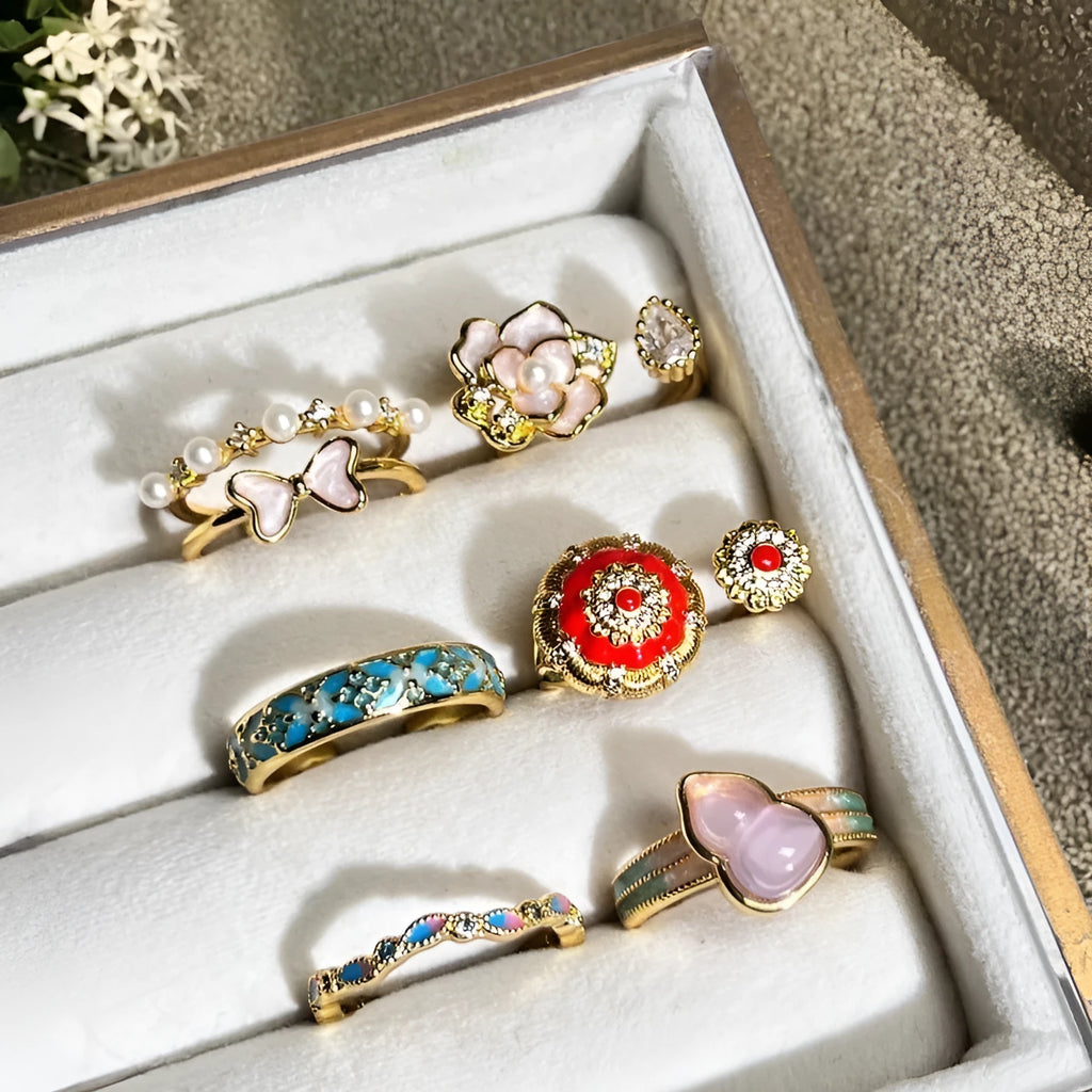 Adjustable copper women's ring with vintage oil drip finish, gourd shape, and inlaid zircon stones in floral and bow designs.