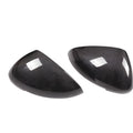 Pair of black true carbon fibre rearview mirror covers for a Porsche Macan.