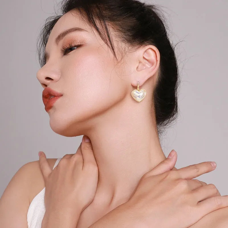 Gold colour alloy ear clips with metal elements and natural style for women