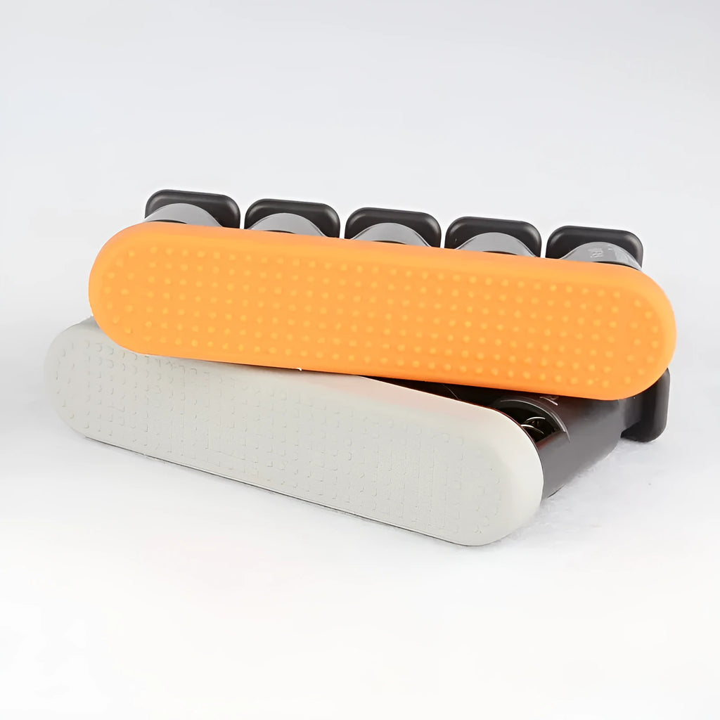 Grey and orange non-slip silicone climbing fingerboard finger trainer for hand strength development.