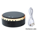 Black solar-powered car air humidifier mounted on vehicle air conditioning outlet