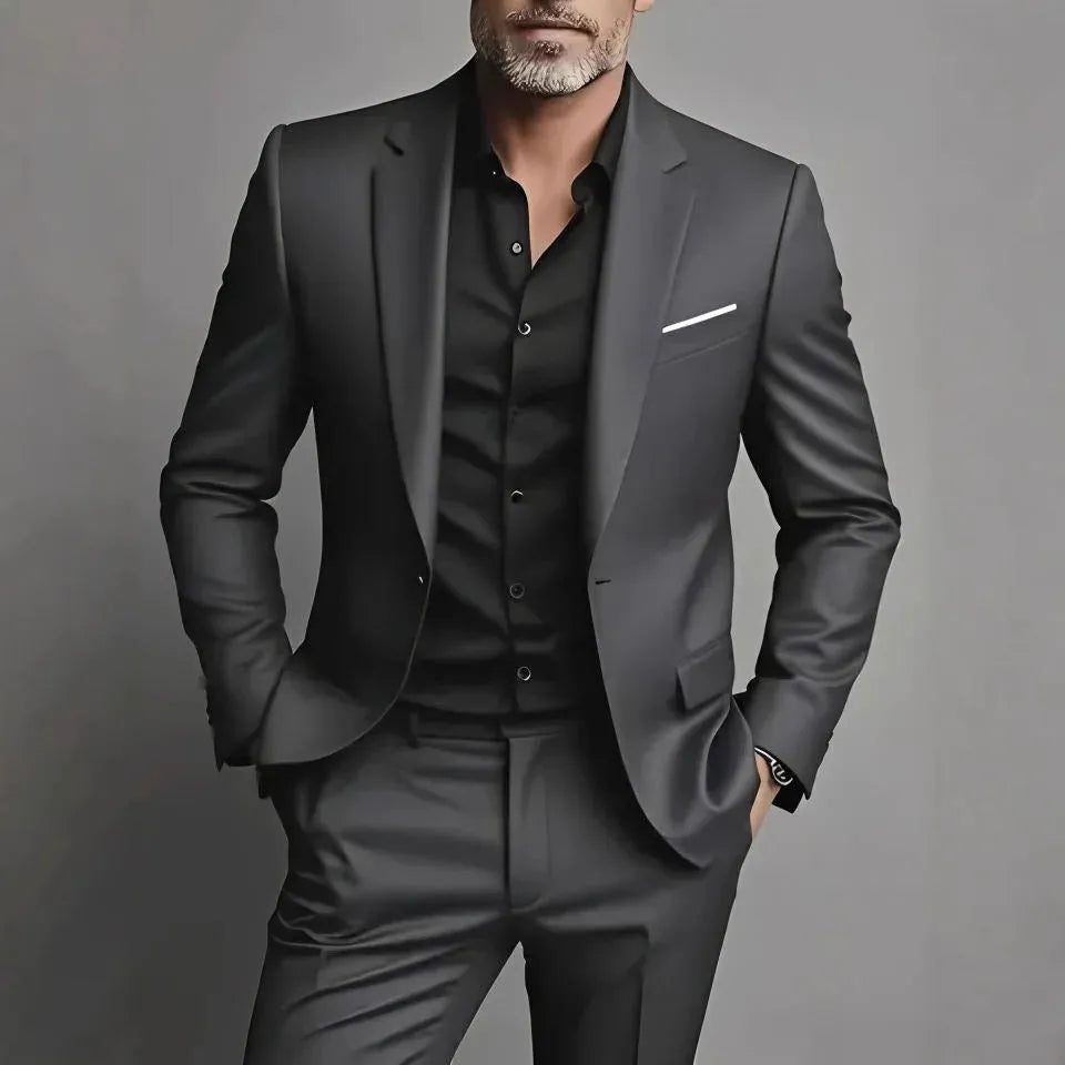 Men's slim fit casual two-piece suit set in black cotton blend fabric with coat and trousers on a hanger.