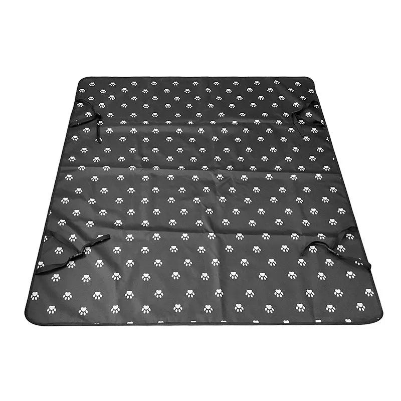 Grey dog bone print water resistant car pet mat measuring 140x110cm on a car rear seat.