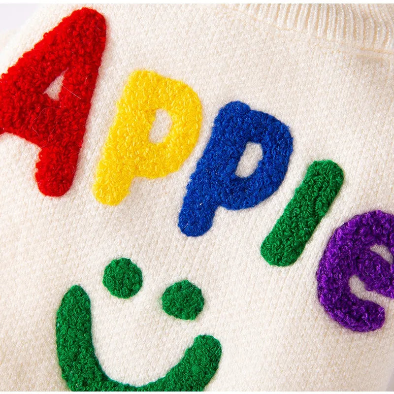 Knitted small dog sweater in white with multicolour Apple and smiley face embroidery