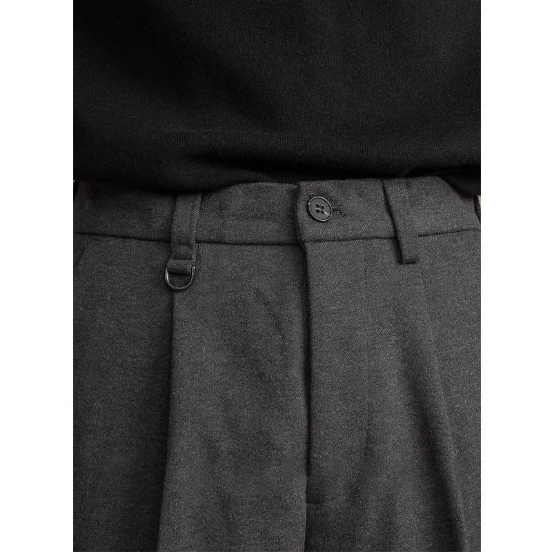 Men's straight leg trousers in dark grey with draped casual styling for winter business casual wear