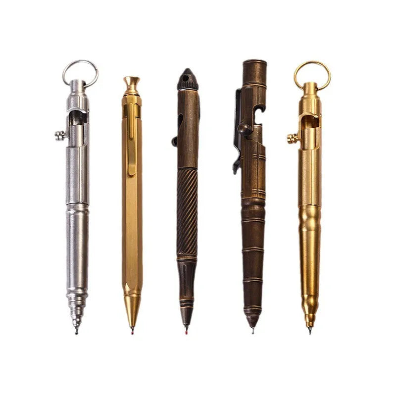 Solid brass cylindrical tactical pen with a press mechanism and six-ring detail.