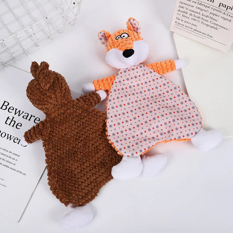 Brown plush fox dog toy with squeaker on a grey background.