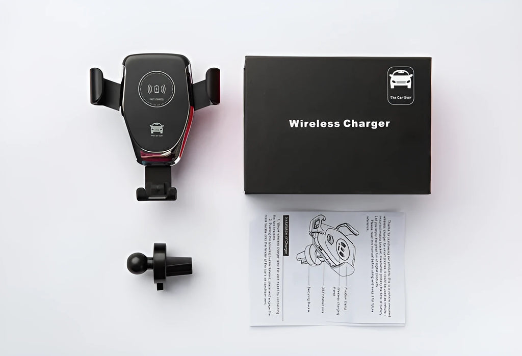Black car wireless phone charger mounted on a vehicle vent, holding an iPhone.