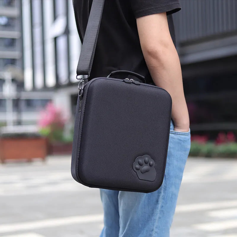 Nintendo Switch console storage bag with cat claw design, game card slots and a diagonal shoulder strap.