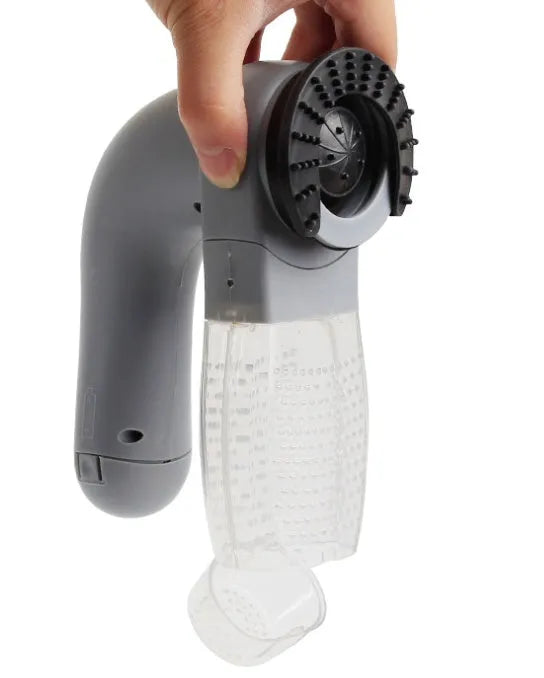 Grey portable electric pet hair vacuum cleaner with soft rubber head for dogs and cats.