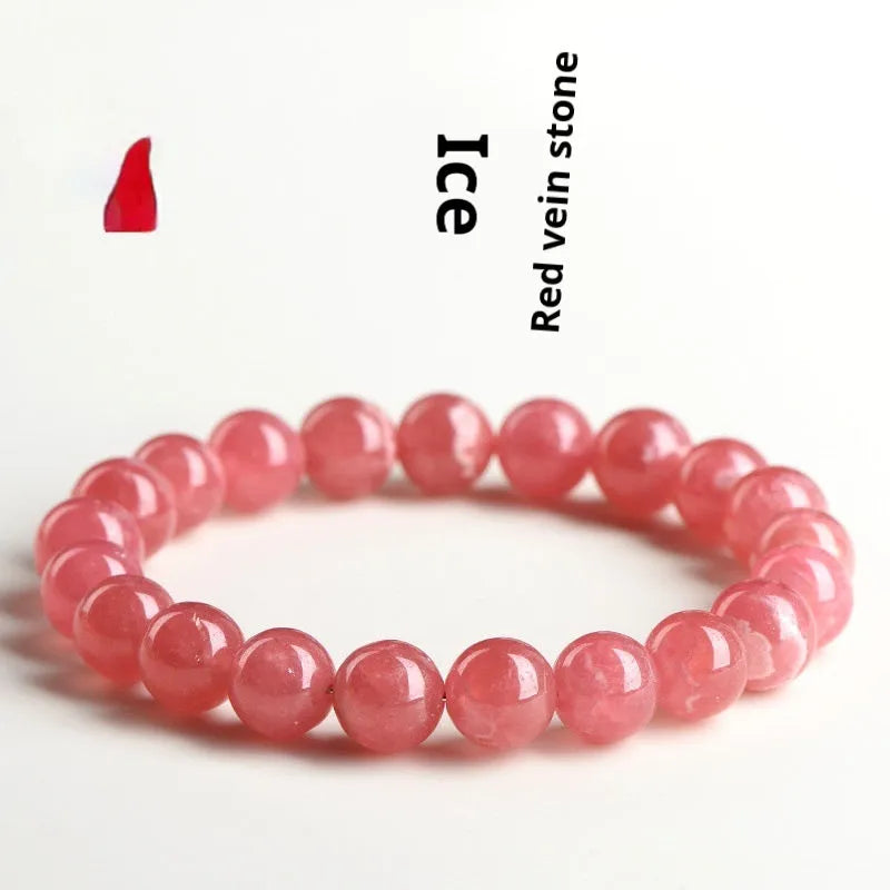 Women's crystal bracelet with red rhodochrosite stones in geometric design featuring longevity lock element