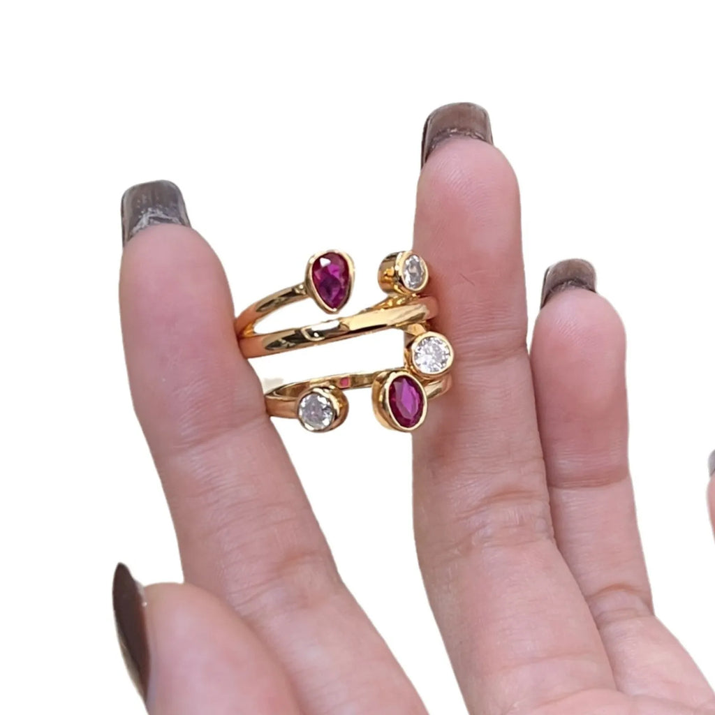 Copper geometric ring with irregular cross design and two-colour electroplated diamond decoration