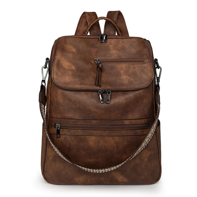 Retro college student backpack in black with curved shoulder straps and stitching detail
