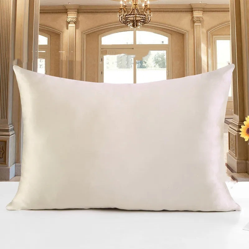 Double-sided 19 M silk pillowcase in apricot colour, showing smooth satin weave texture.