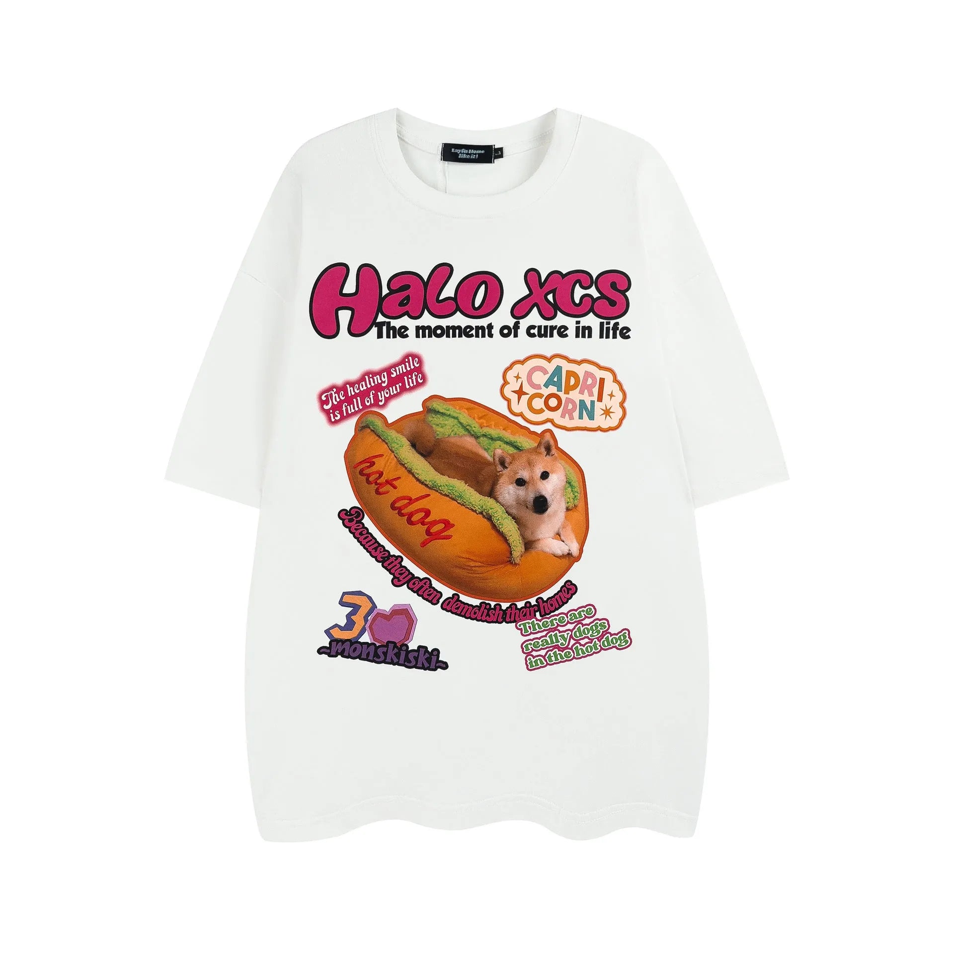 Cartoon hamburger dog printed loose-fit cotton t-shirt in apricot on a model.