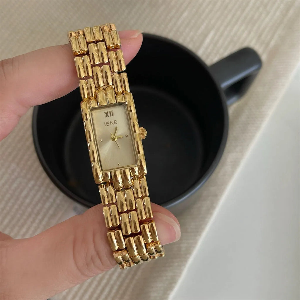 Women's stainless steel bracelet watch with 15mm dial and butterfly clasp in silver and gold colour options