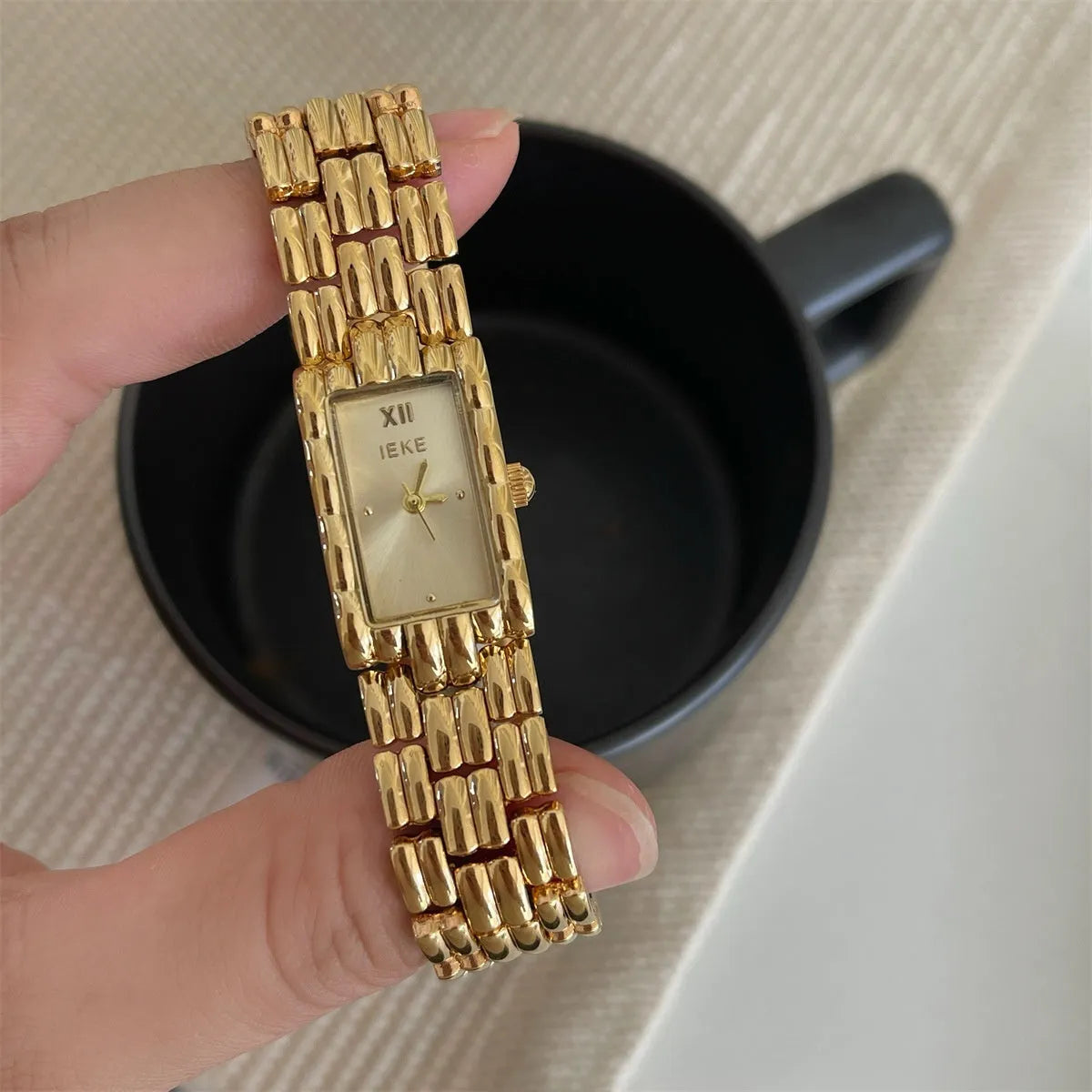Women's stainless steel bracelet watch with 15mm dial and butterfly clasp in silver and gold colour options