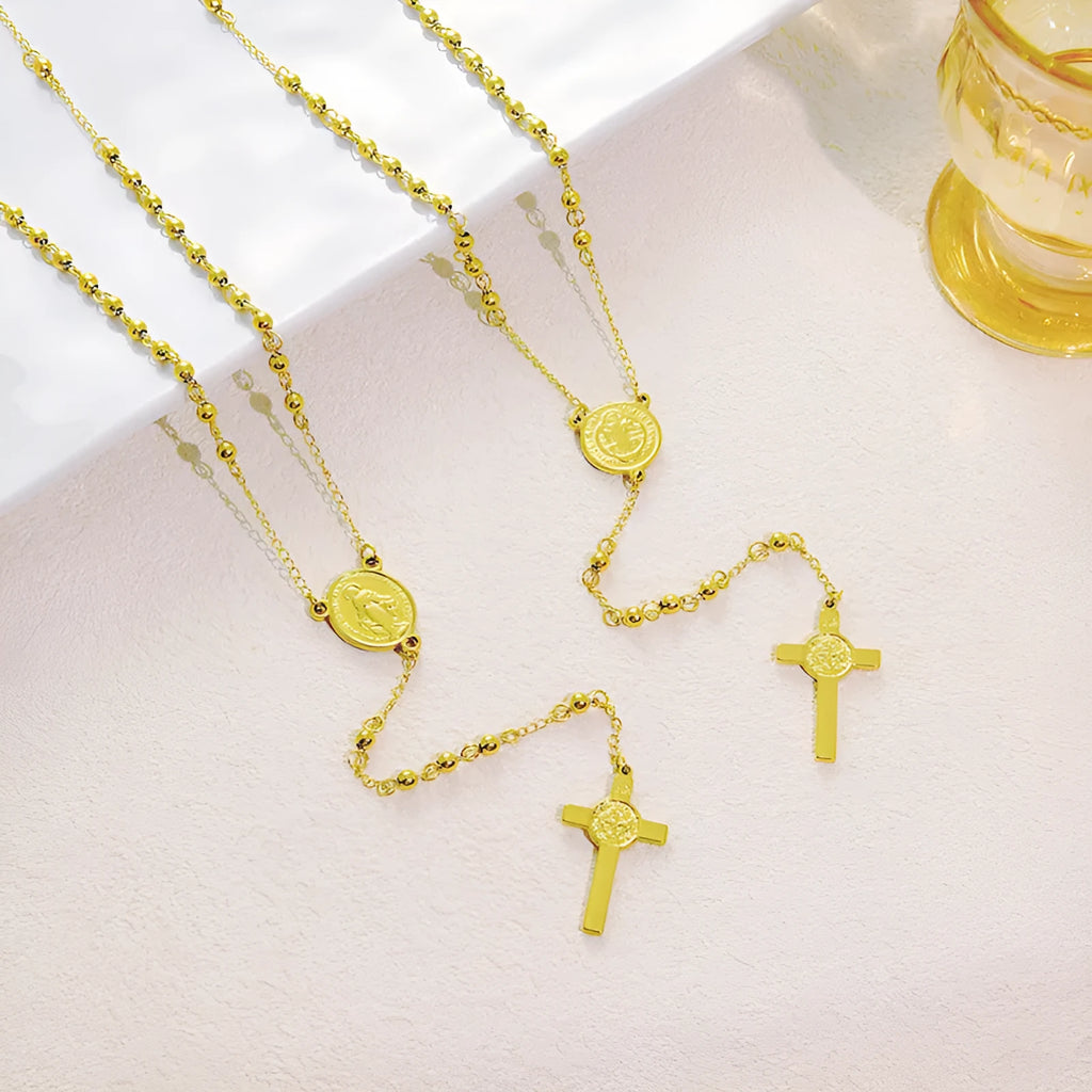 Stainless steel cross pendant necklace in golden colour with a priest pendant design on a simple chain